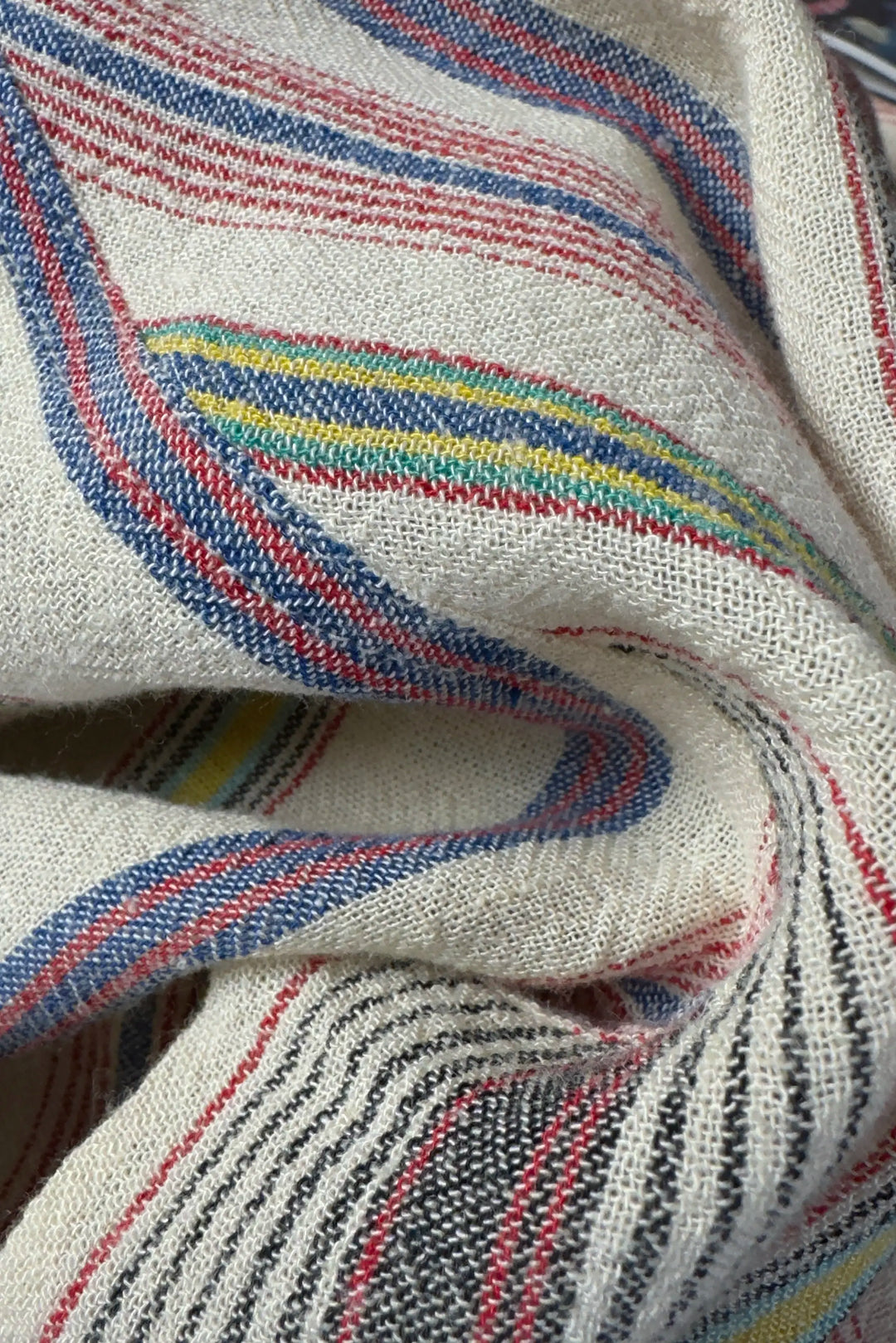Close-up of striped fabric with multicolor pattern