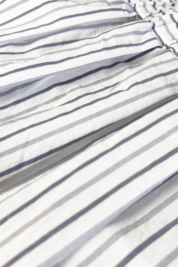 Close-up of striped fabric with white and gray lines