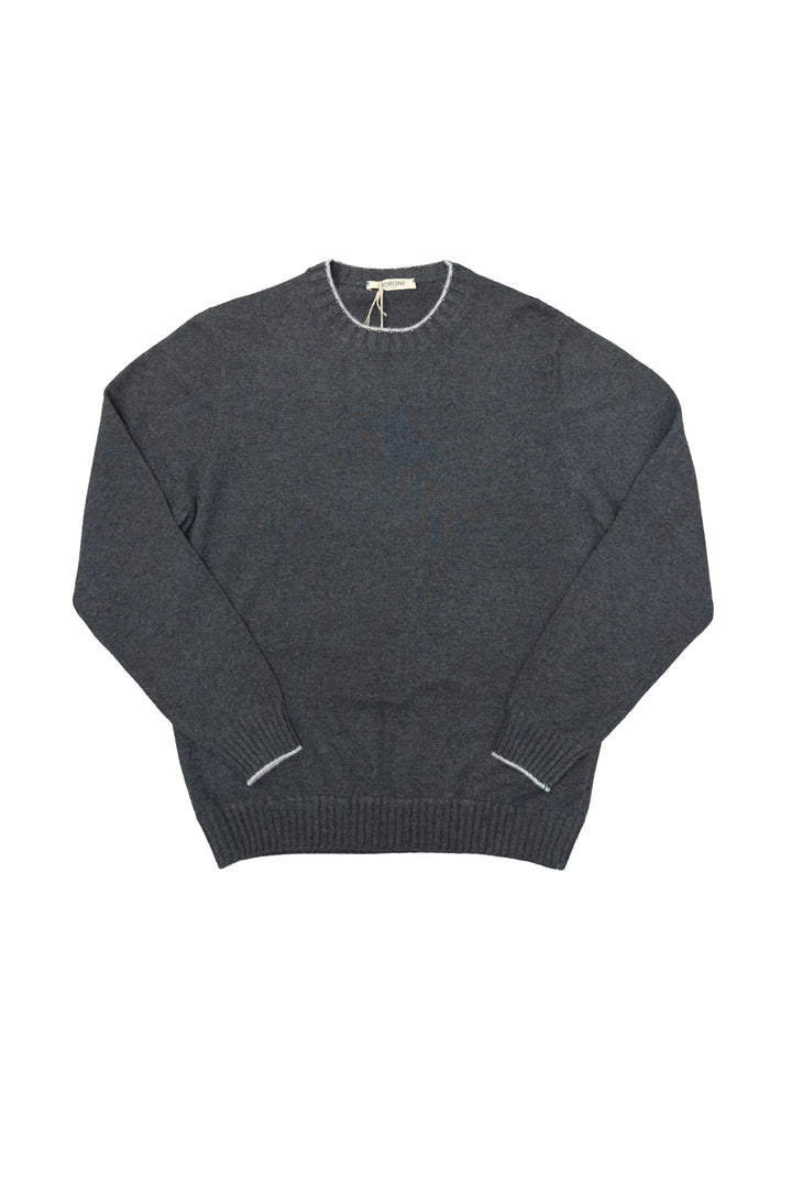 Dark gray sweater with white trim on a white background