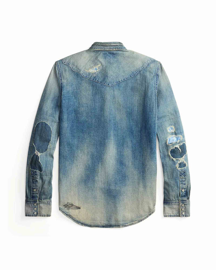 Denim shirt with distressed details on a white background
