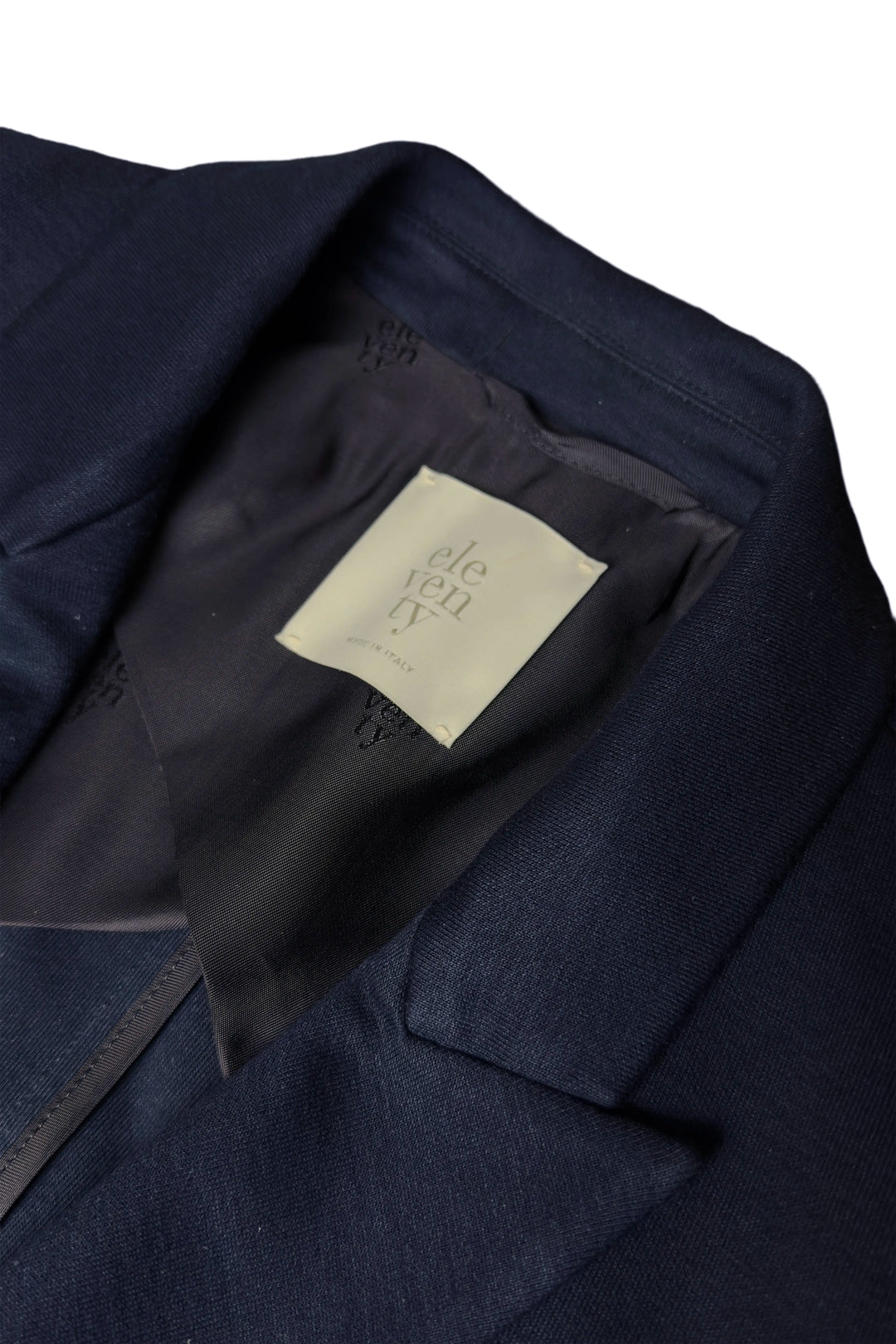 Navy blue suit jacket with a brand label on a white background