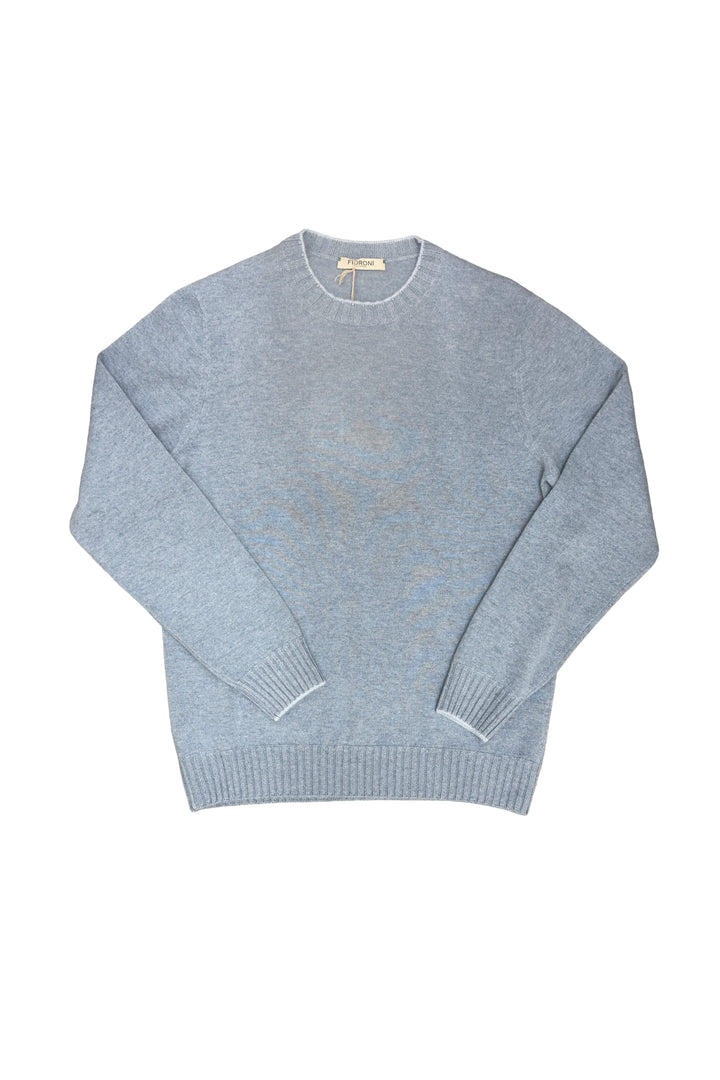 Light blue sweater on a white background