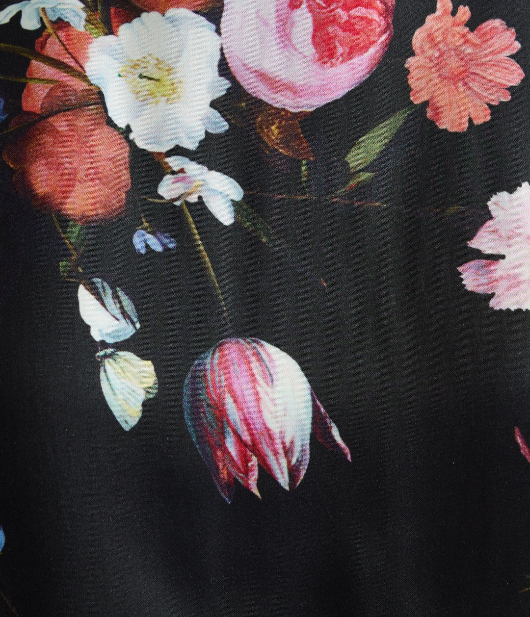 Floral design with pink, white, and red flowers on a dark background