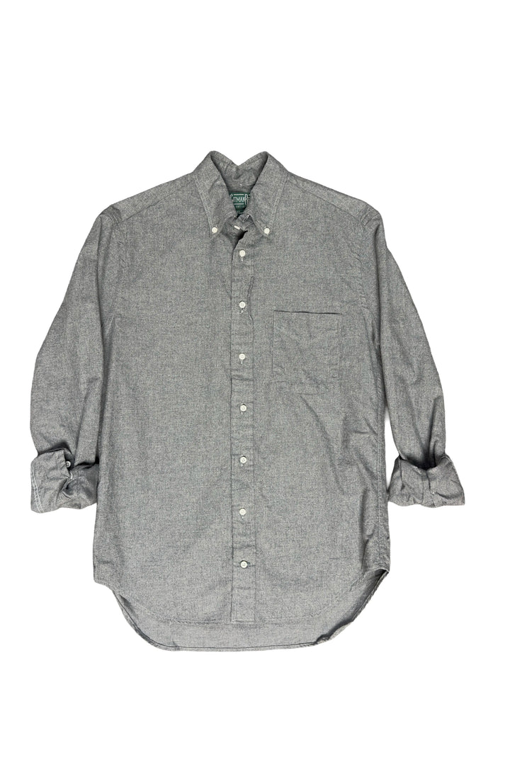 Gray checkered shirt on a white background