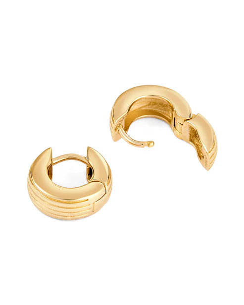 Gold hoop earrings on a white background