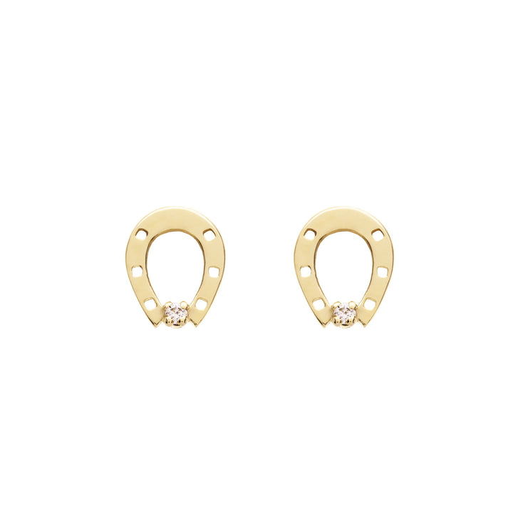 Gold horseshoe-shaped earrings with small diamonds on a white background