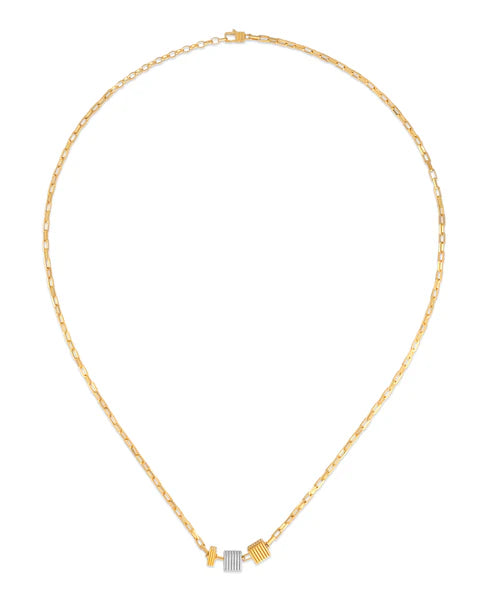 Gold necklace with a small pendant on a white background