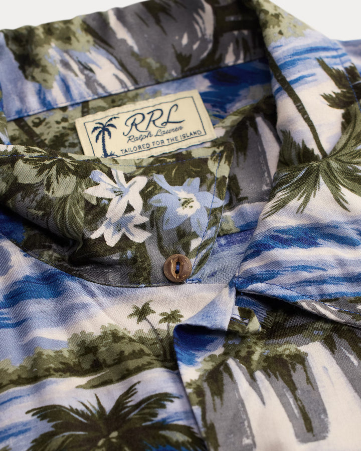 Hawaiian shirt with palm tree and floral pattern, featuring Ralph Lauren logo.