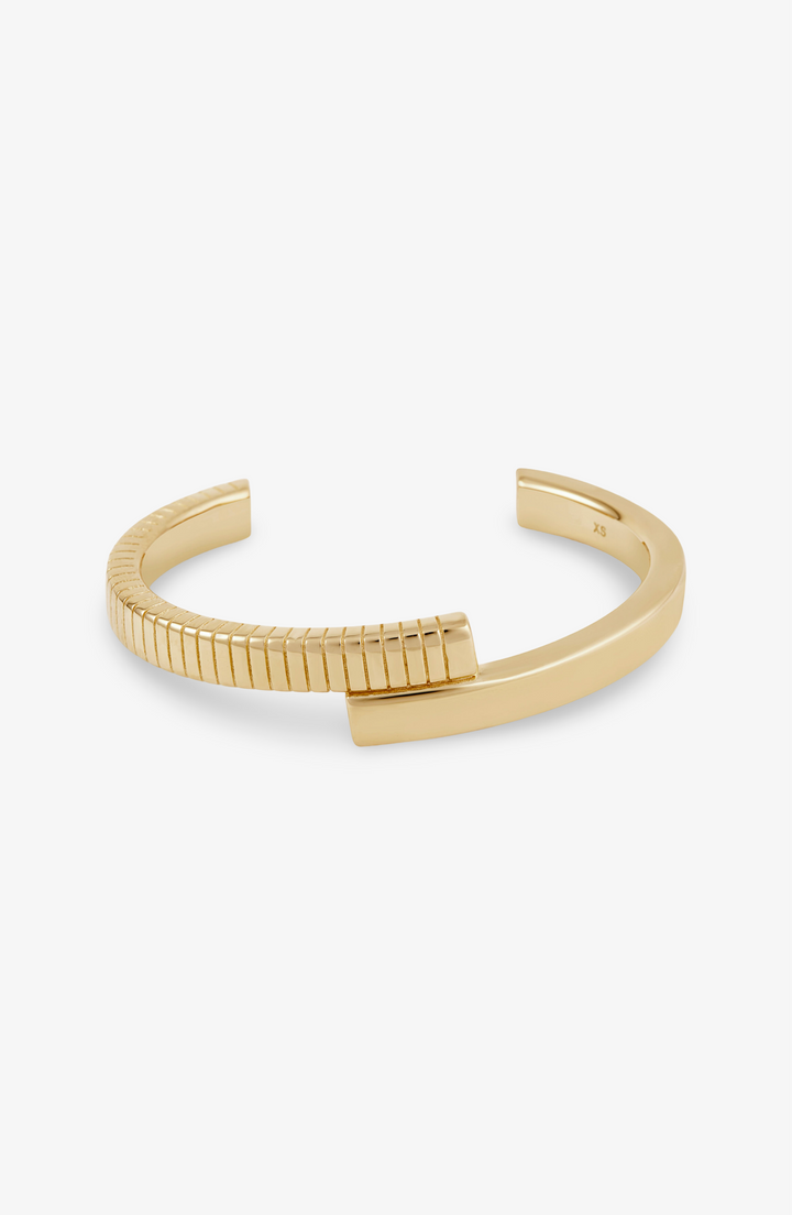 Gold bracelet on a white background