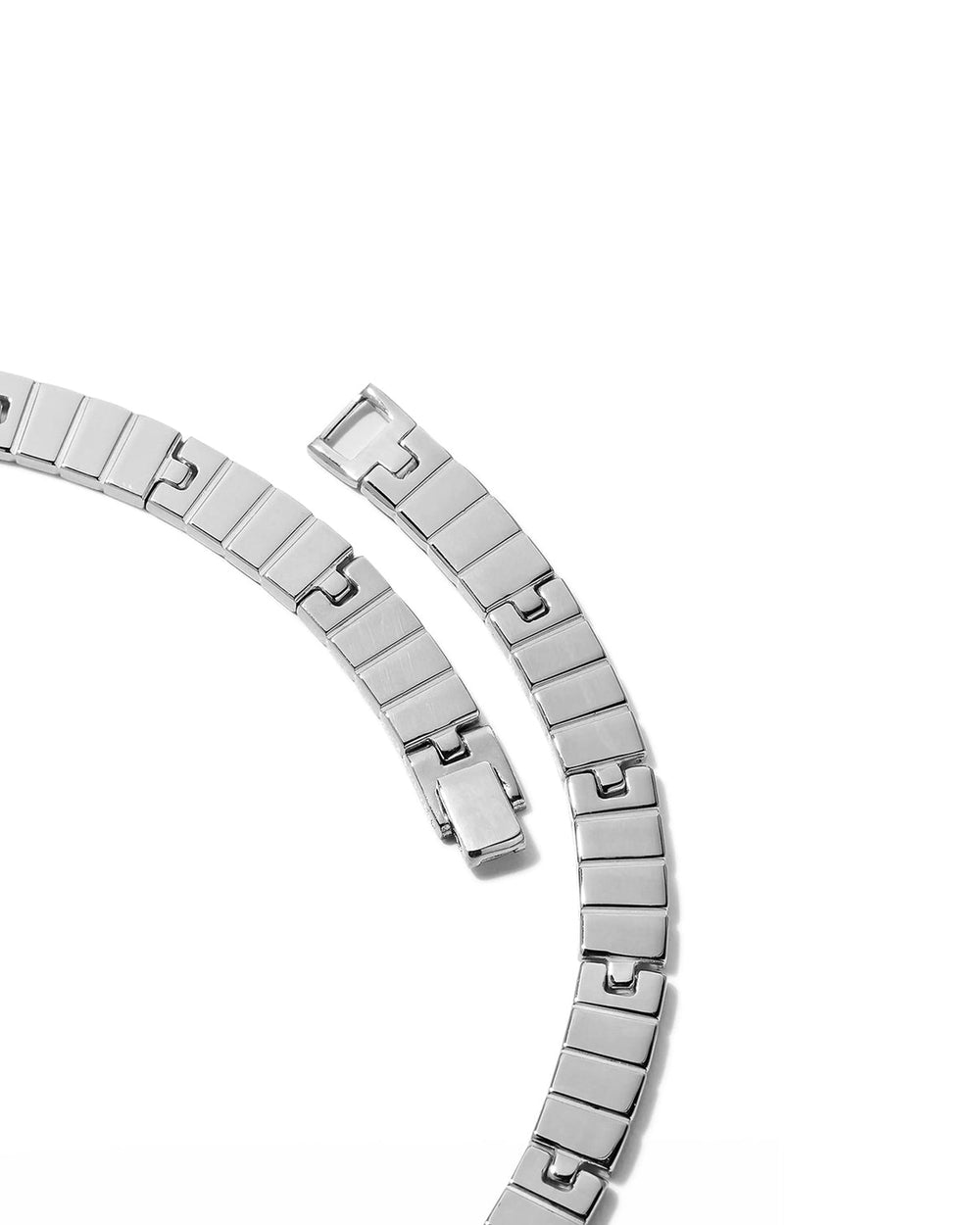 Silver metal bracelet on a white background