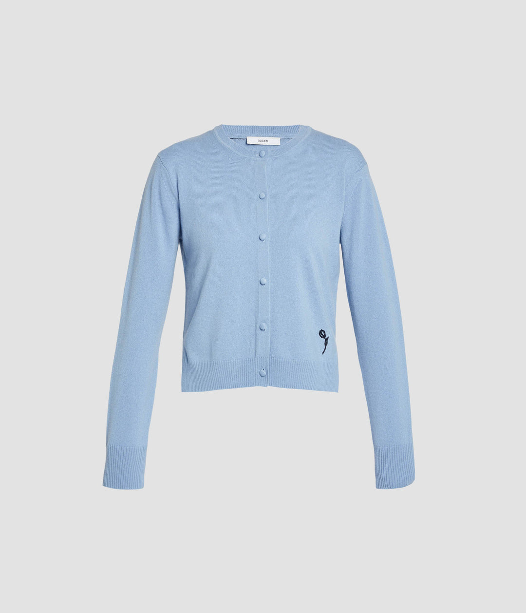 Light blue cardigan on a light gray background