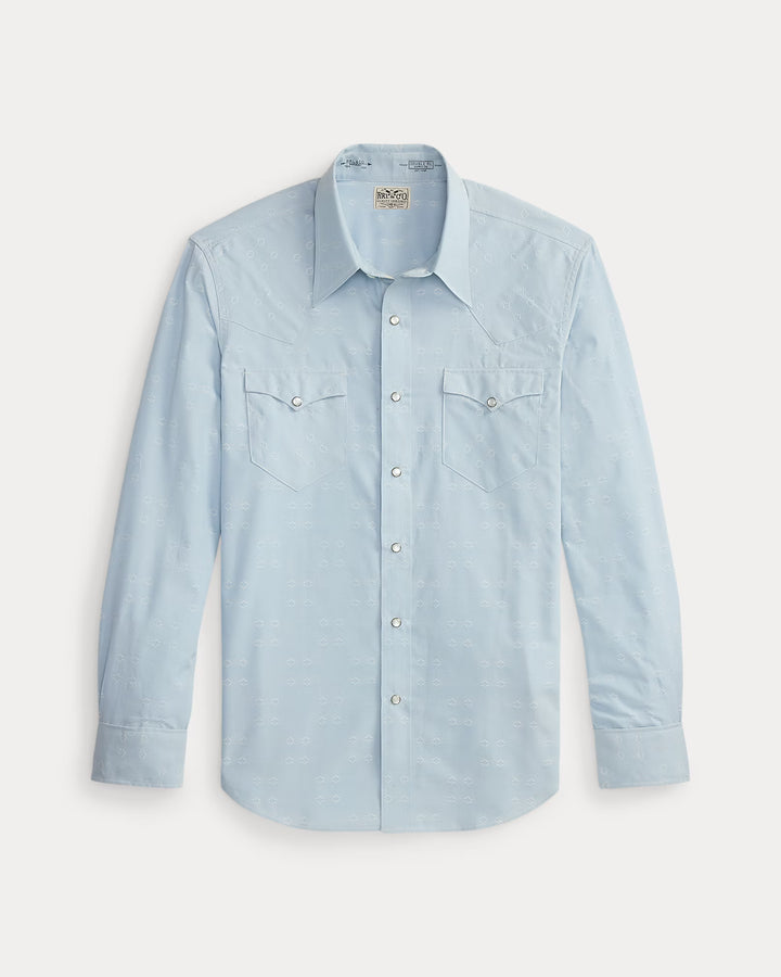 Light blue denim shirt with button details on a light gray background