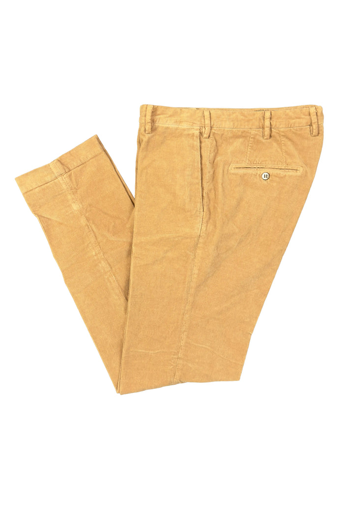 Pair of beige pants on a white background