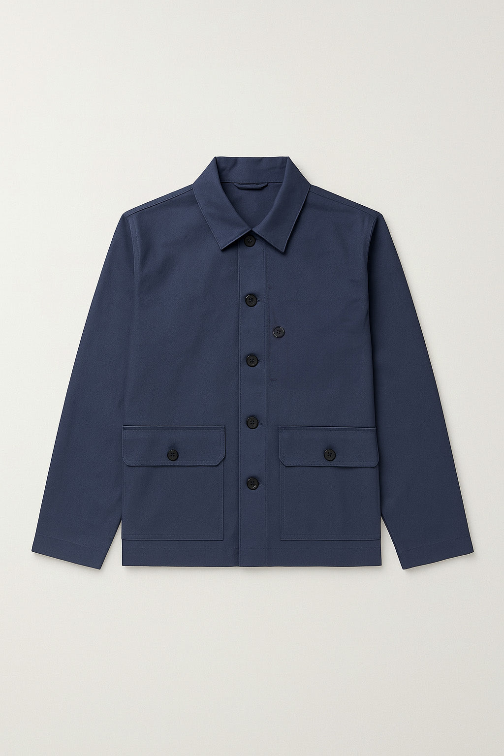 Navy blue jacket with button details on a light gray background