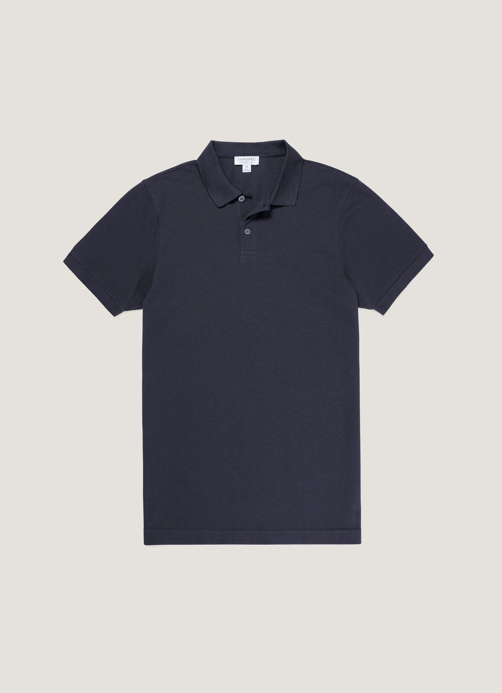 Navy blue polo shirt on a light gray background