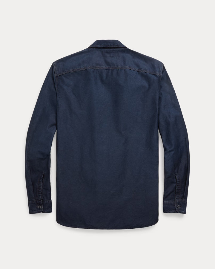 Navy blue shirt on a light gray background
