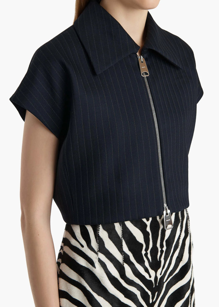 Navy pinstripe vest with a zipper on a white background