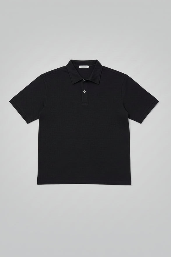 Black polo shirt on a light gray background