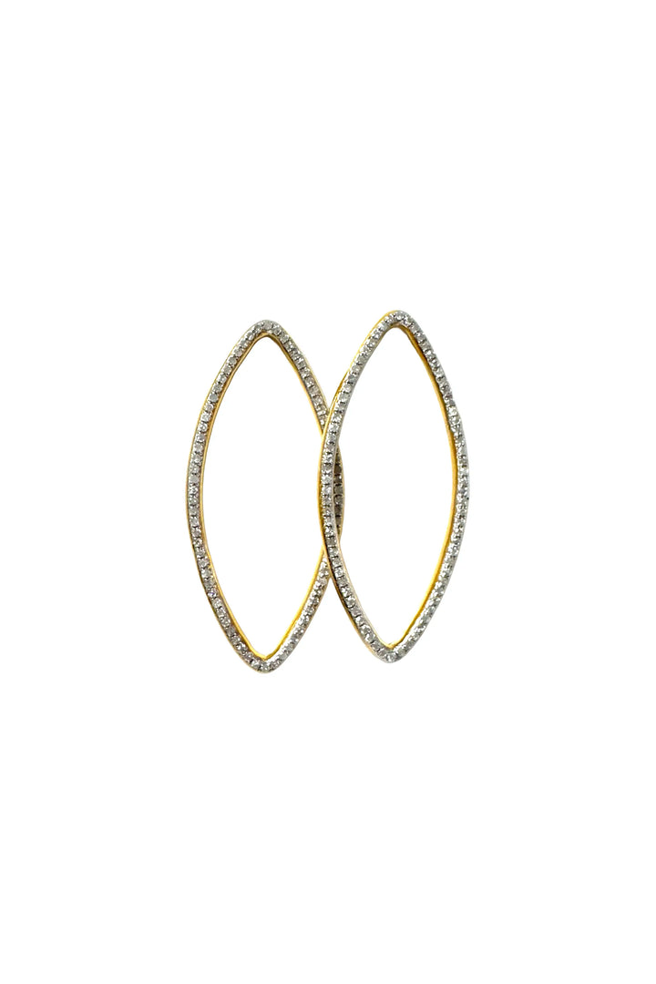 Pair of gold hoop earrings with clear gemstones on a white background