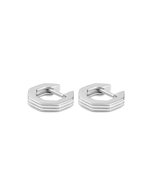 Pair of silver hexagonal hoop earrings on a white background