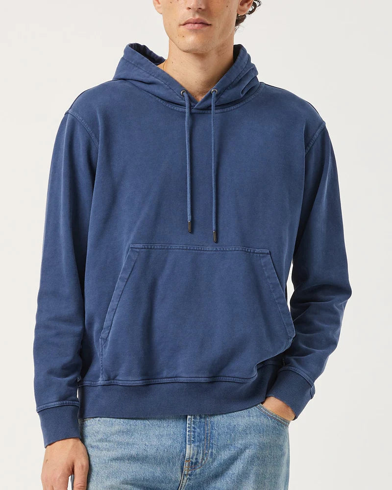 Person wearing a blue hoodie on a white background