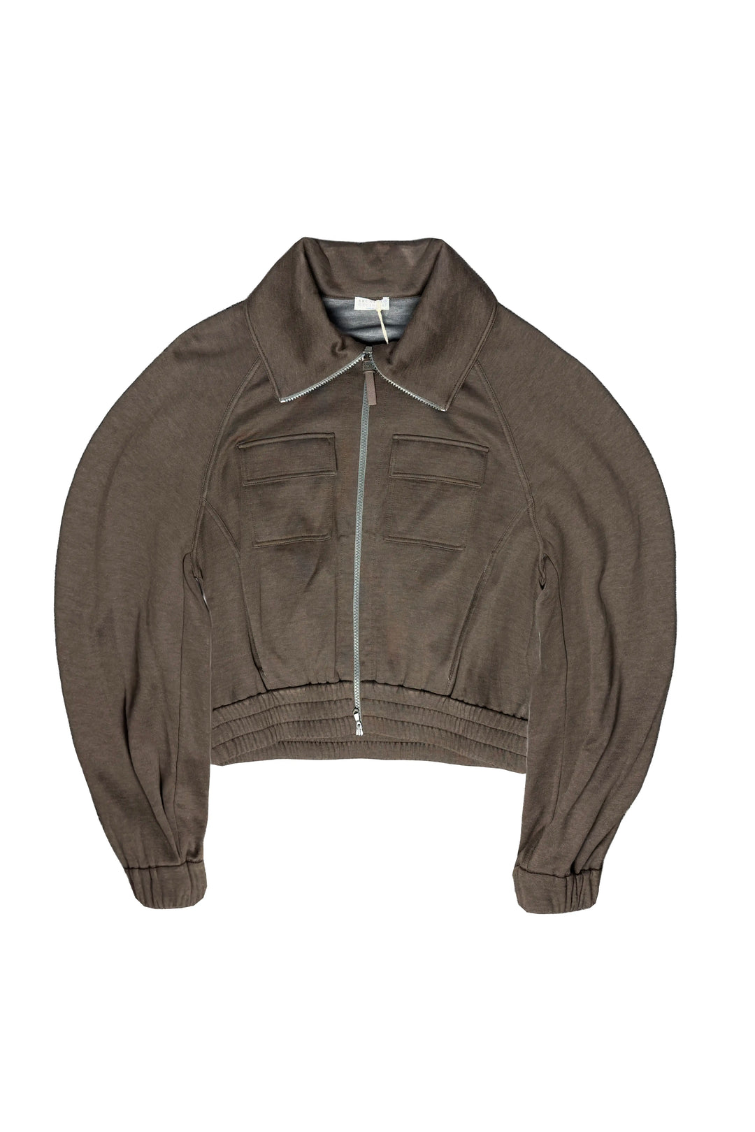 A cropped, long-sleeve zip-up jacket in a muted taupe-brown color, featuring a pointed collar, front zipper, and two flap chest pockets, shown flat against a plain white background.