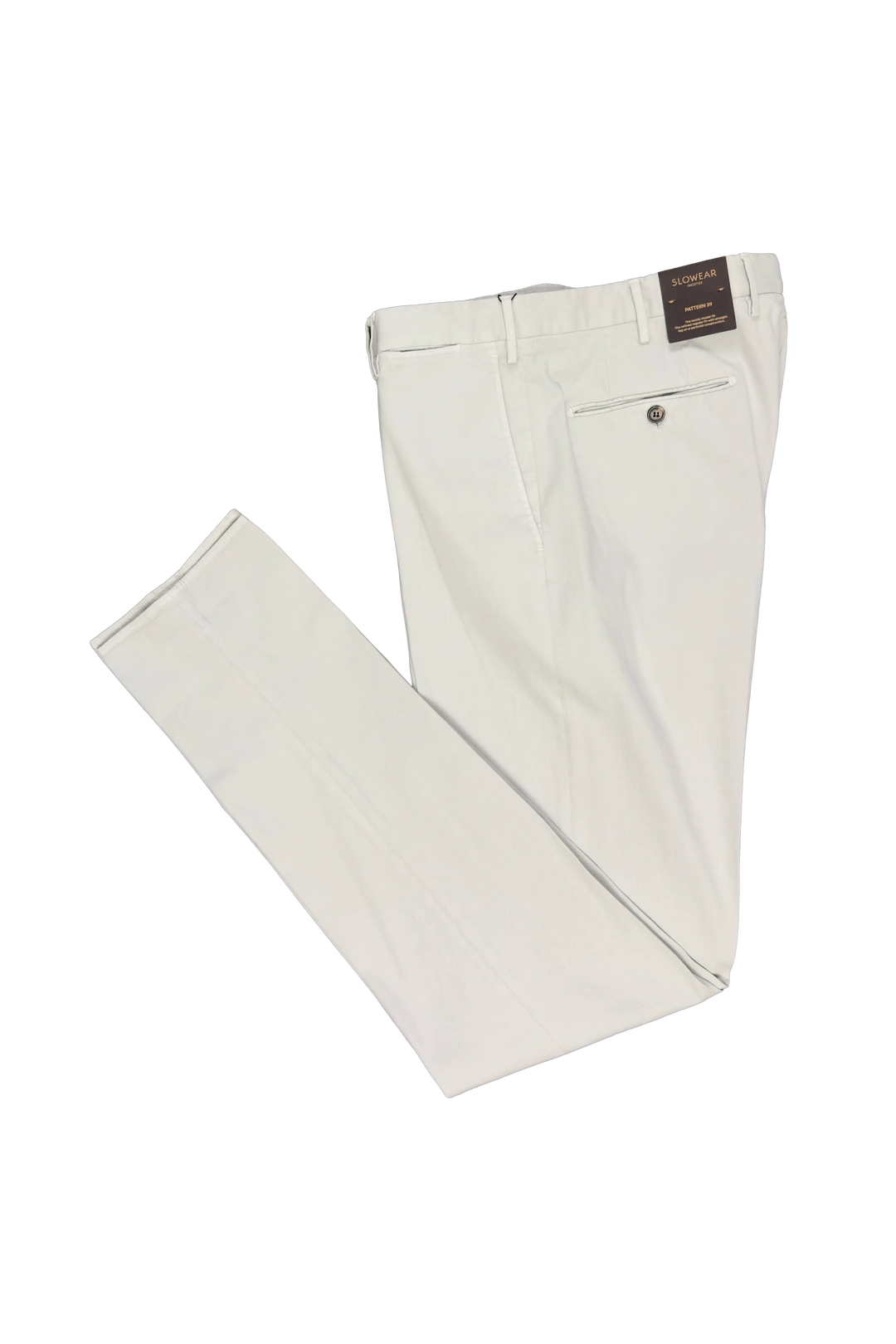 White pants with a brand tag on a white background
