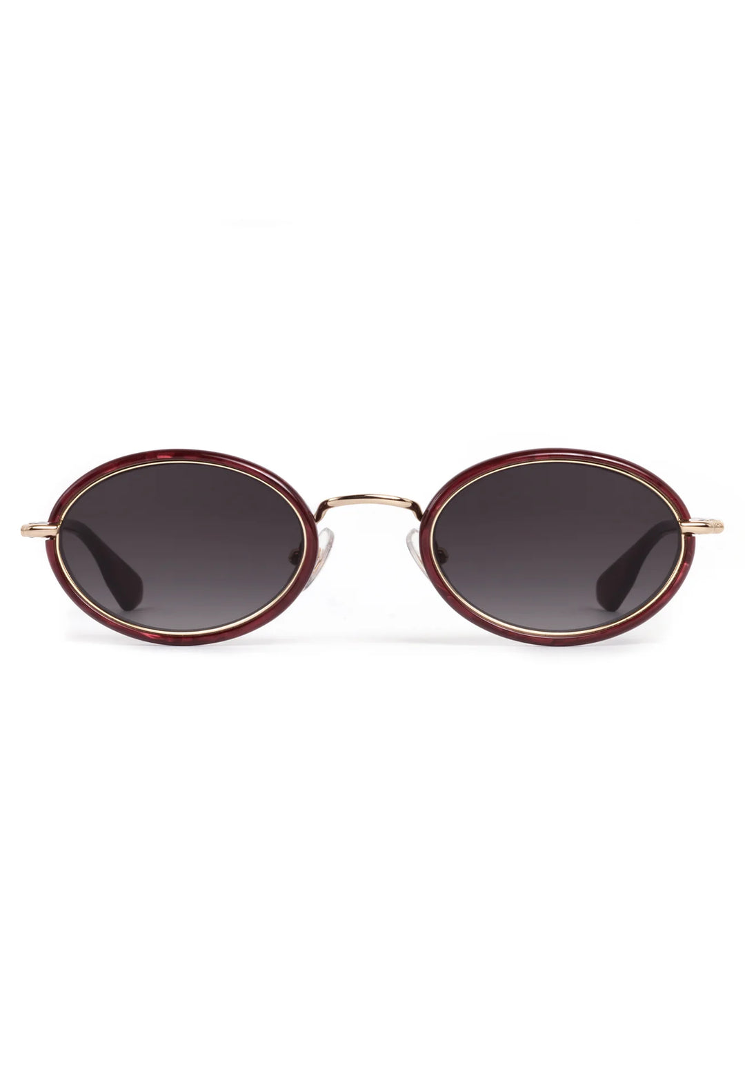 Round sunglasses with gold frame and dark lenses on a white background