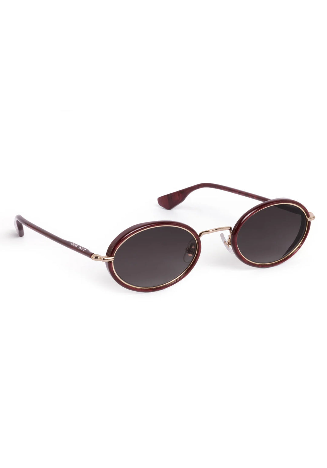 Sunglasses with brown frame and dark lenses on a white background