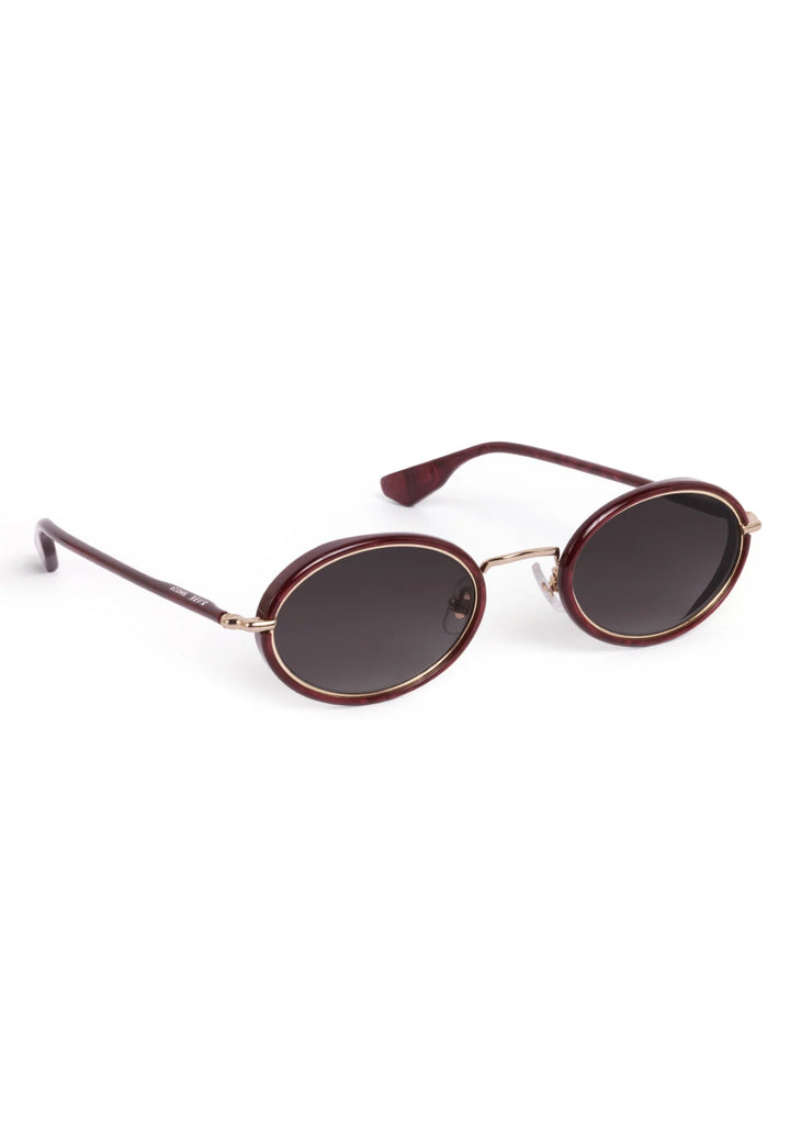Sunglasses with brown frame and dark lenses on a white background
