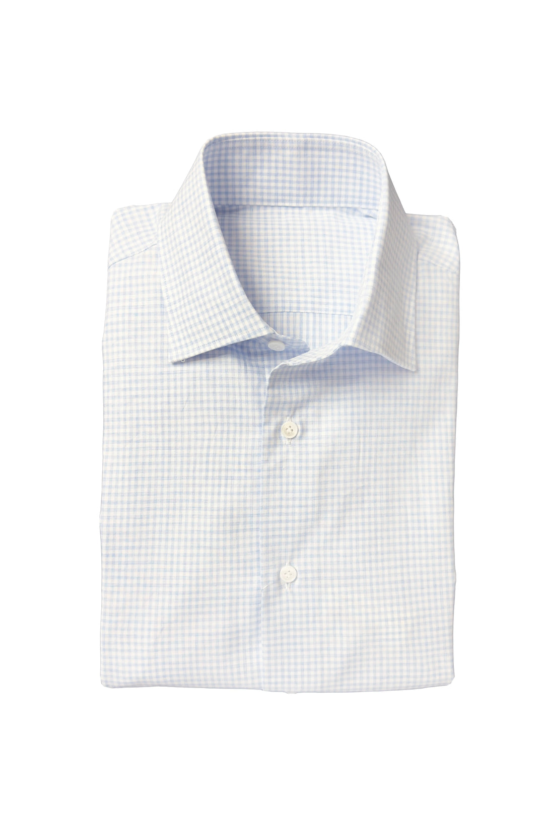 Folded white dress shirt with blue checkered pattern on a white background