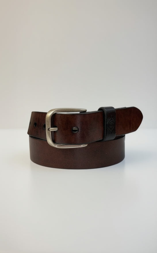 Brown leather belt with a silver buckle on a white background