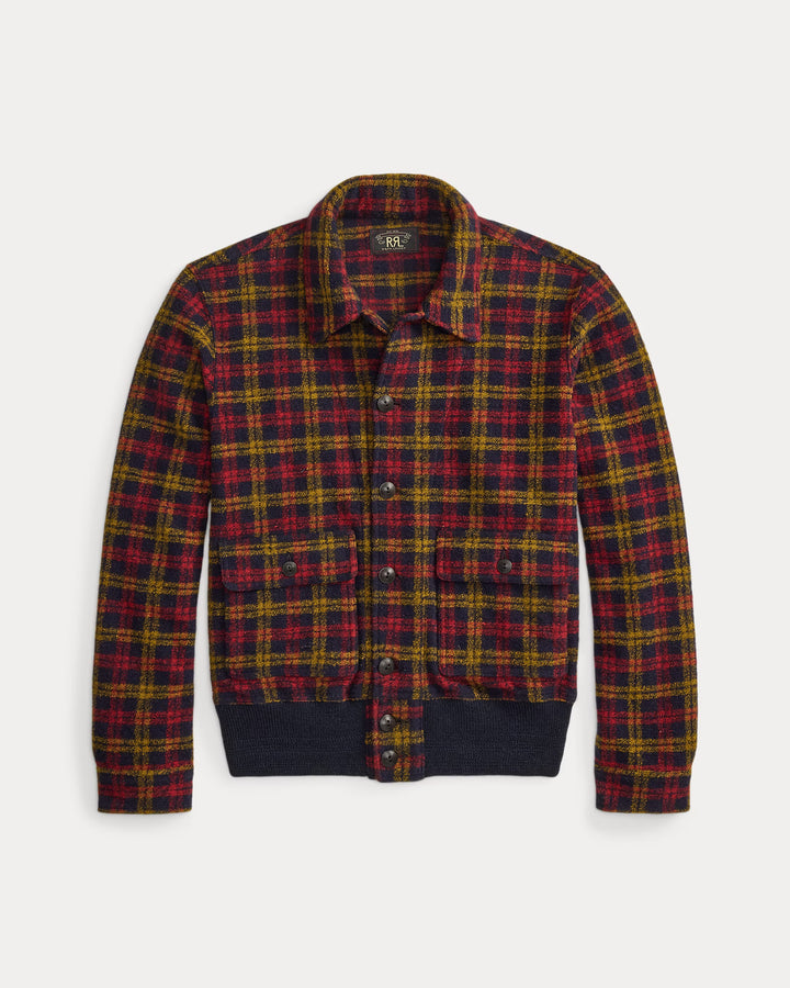 A long-sleeve button-front overshirt jacket featuring a red, yellow, and green plaid pattern with solid navy blue ribbed collar, cuffs, and hem, displayed on a light gray background.