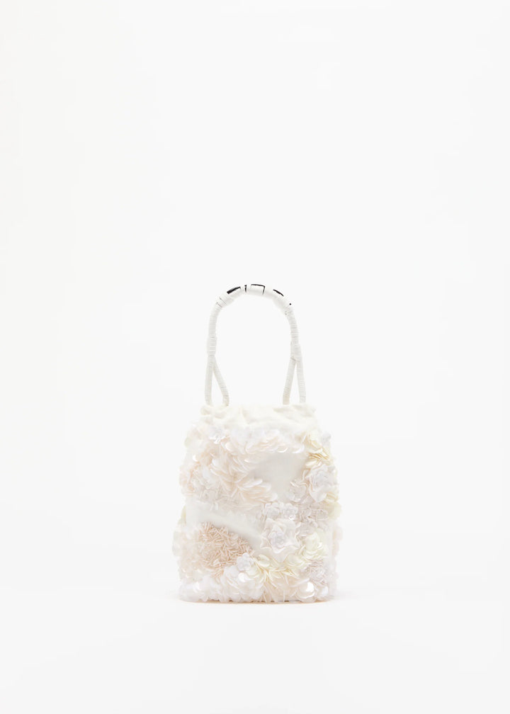 Small handbag with a textured pattern on a white background