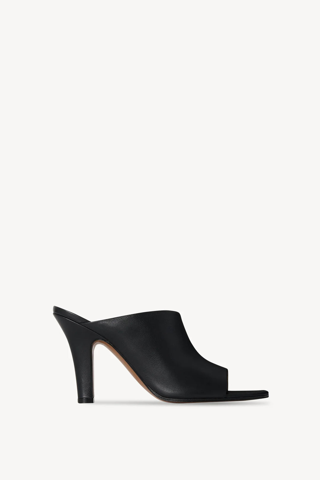 Black high-heeled shoe on a white background