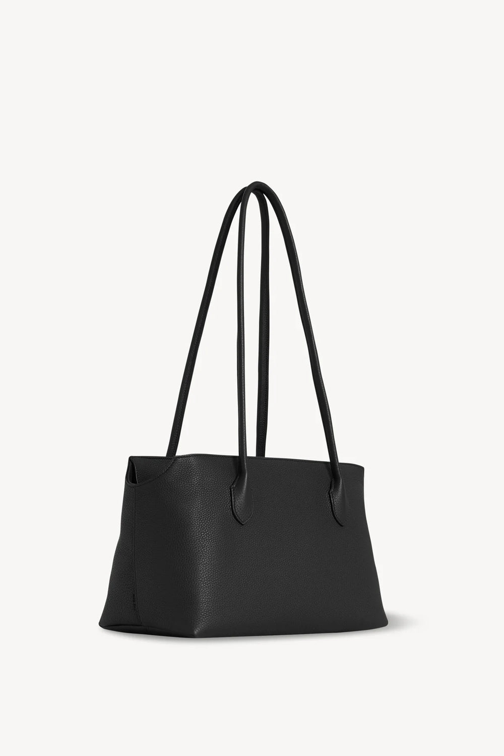 Black handbag with shoulder straps on a white background