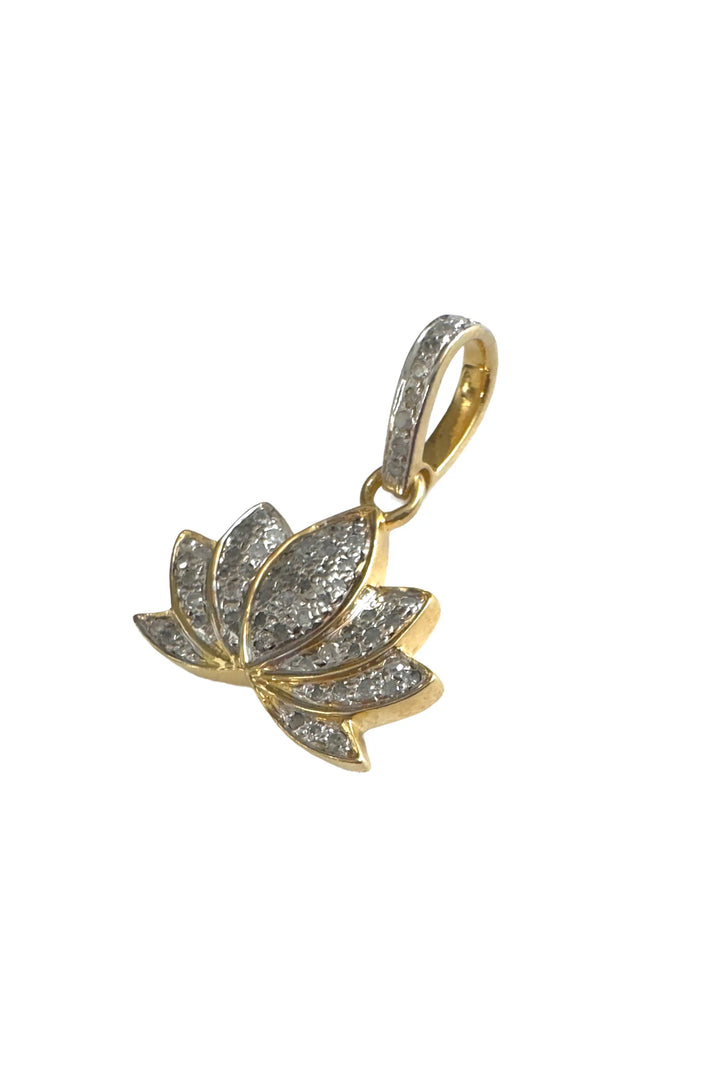 Gold and silver lotus flower pendant on a white background