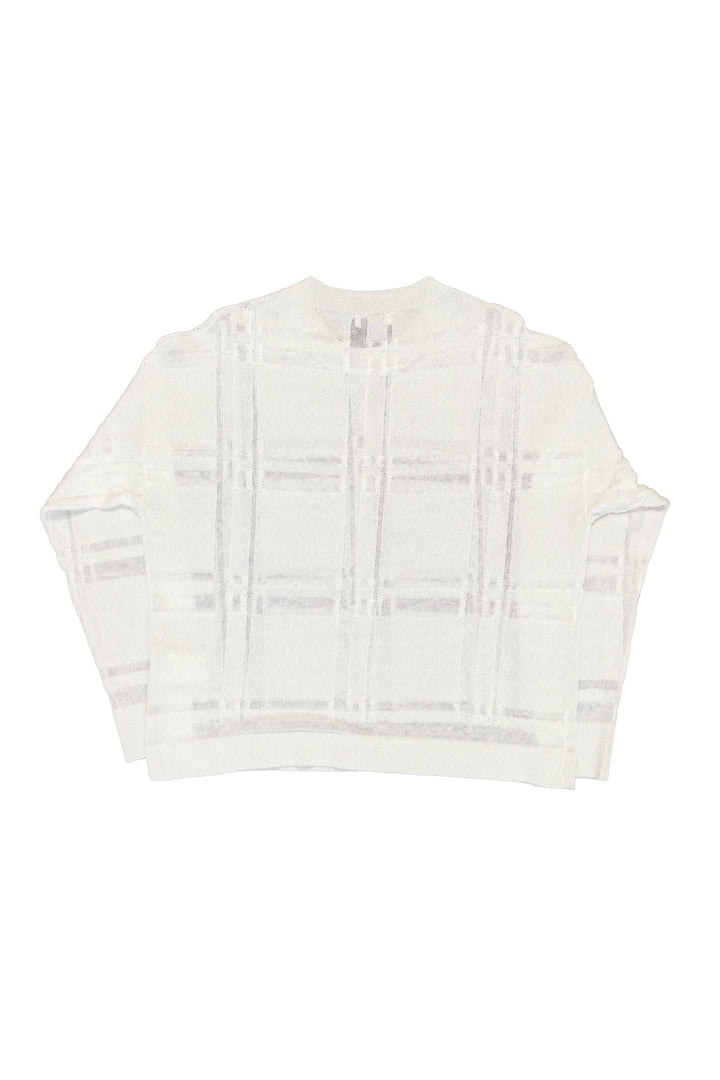 White blouse with ruffled details on a white background
