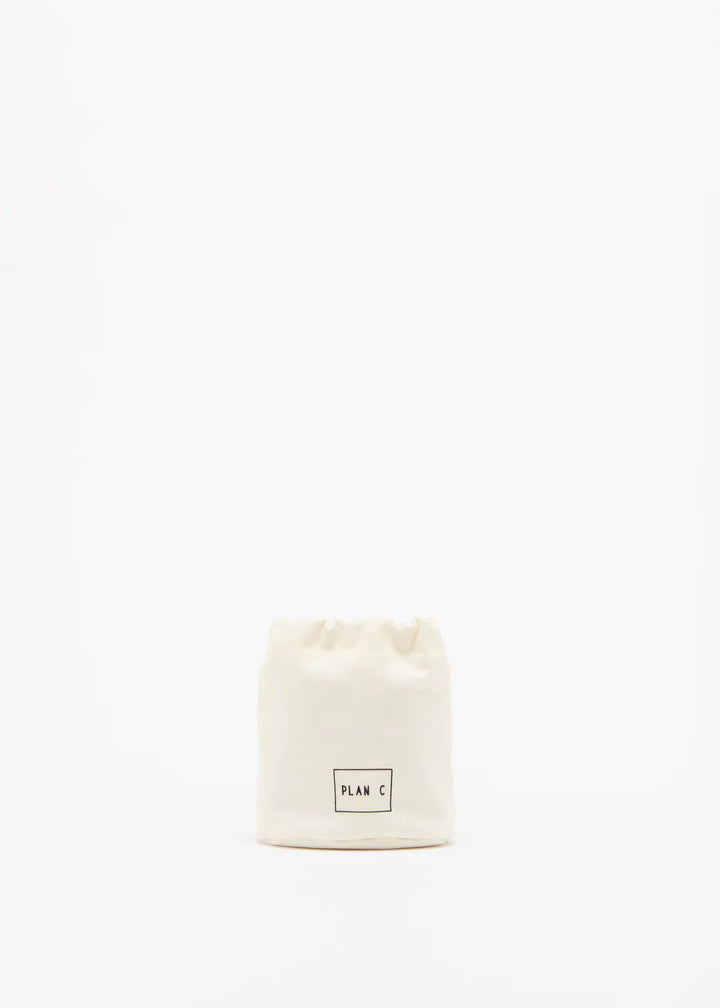 White canvas bag with 'PLAN C' logo on a white background