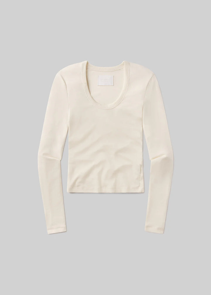 White long-sleeve shirt on a gray background
