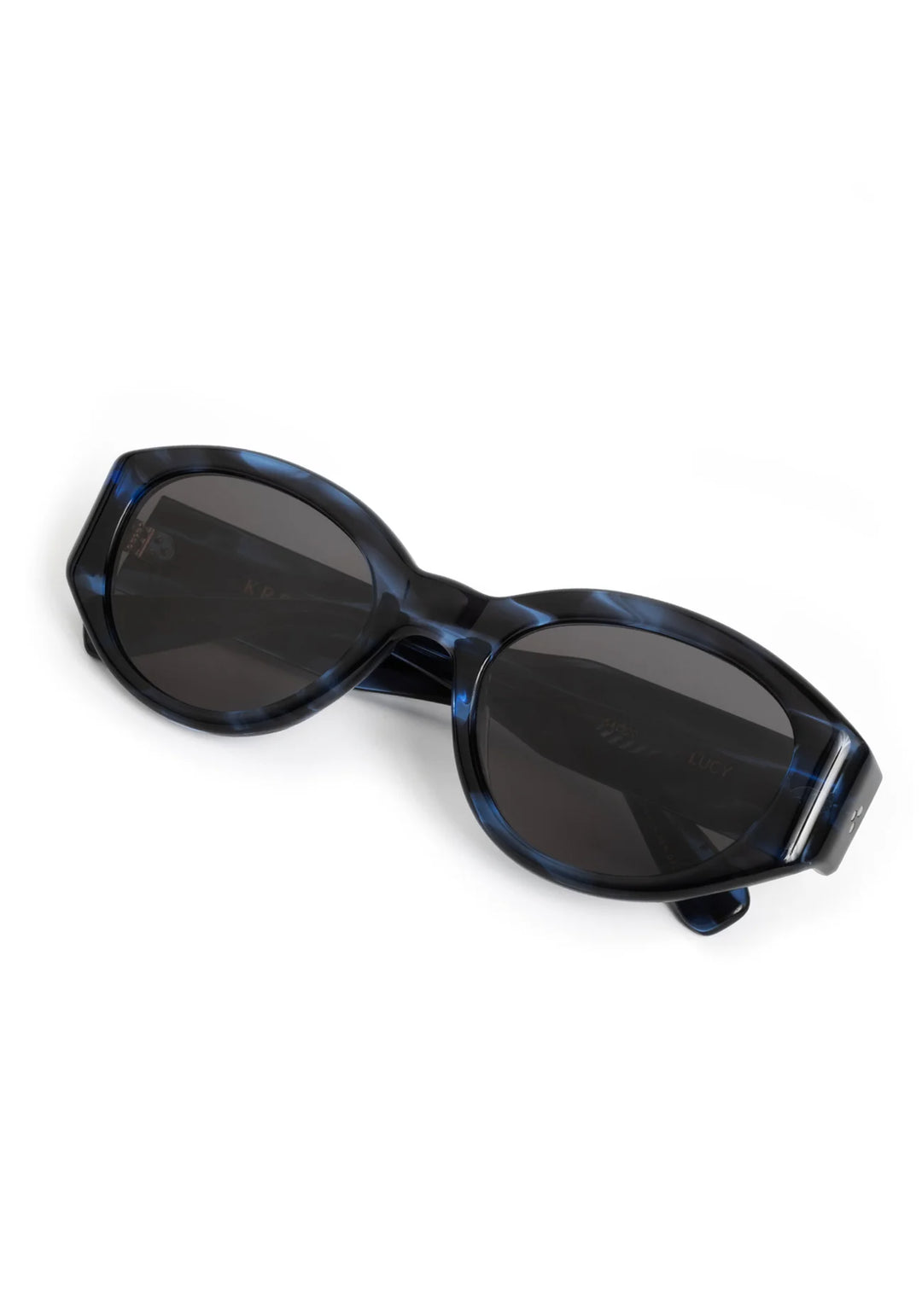 Sunglasses with blue tortoiseshell frame and dark lenses on a white background