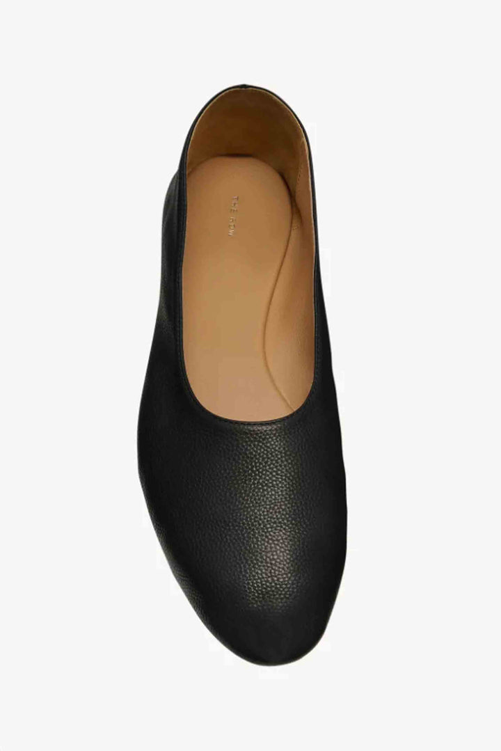 Black leather shoe on a white background