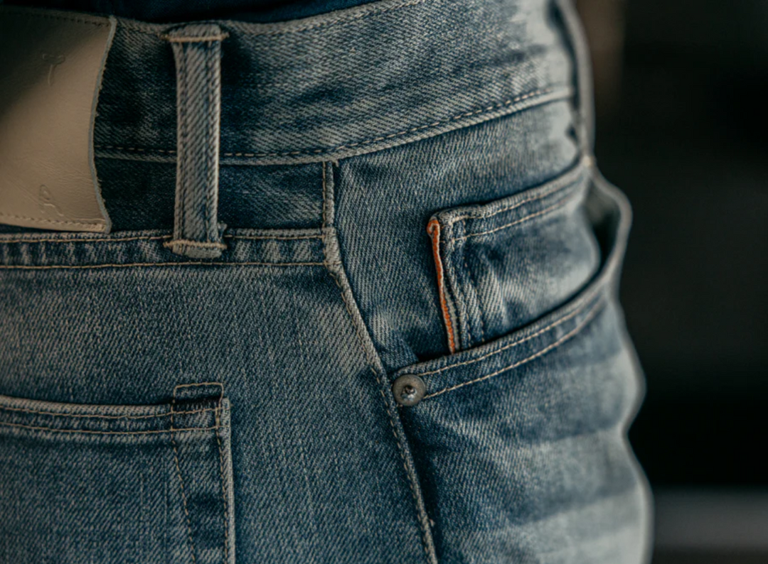 Close-up of blue jeans with a blurred background