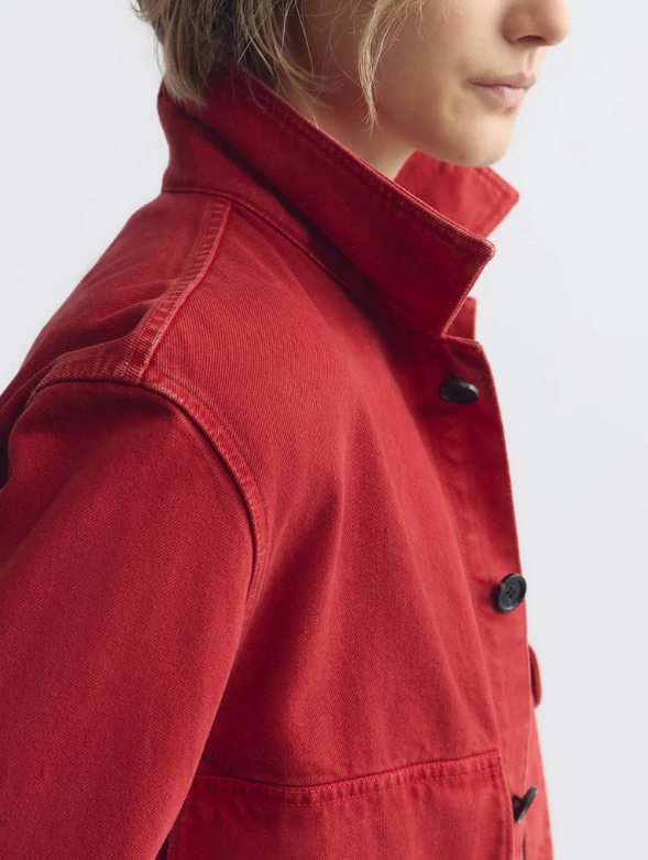 Red jacket worn by a person on a white background