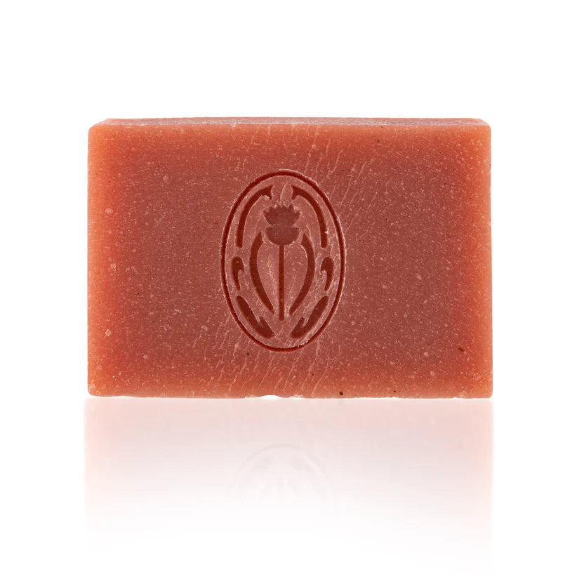 Bar of soap with a logo on a white background