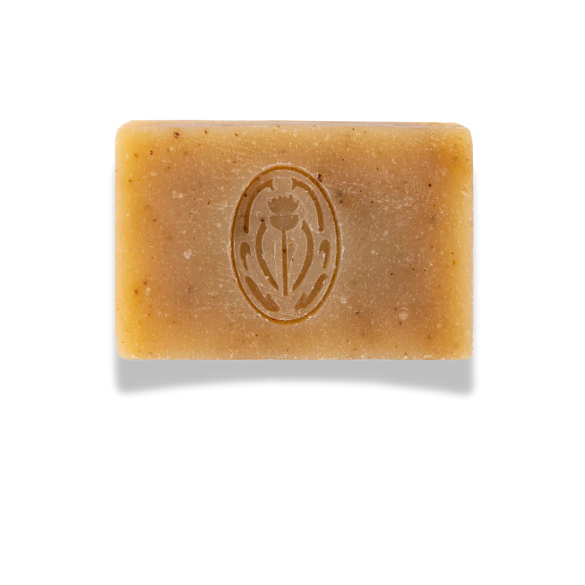 Bar of soap with a logo on a white background