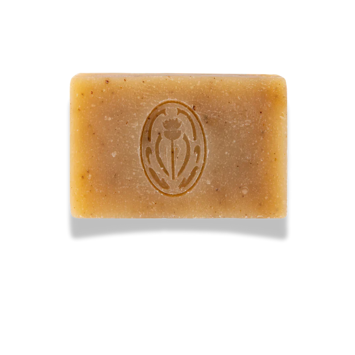 Bar of soap with a logo on a white background