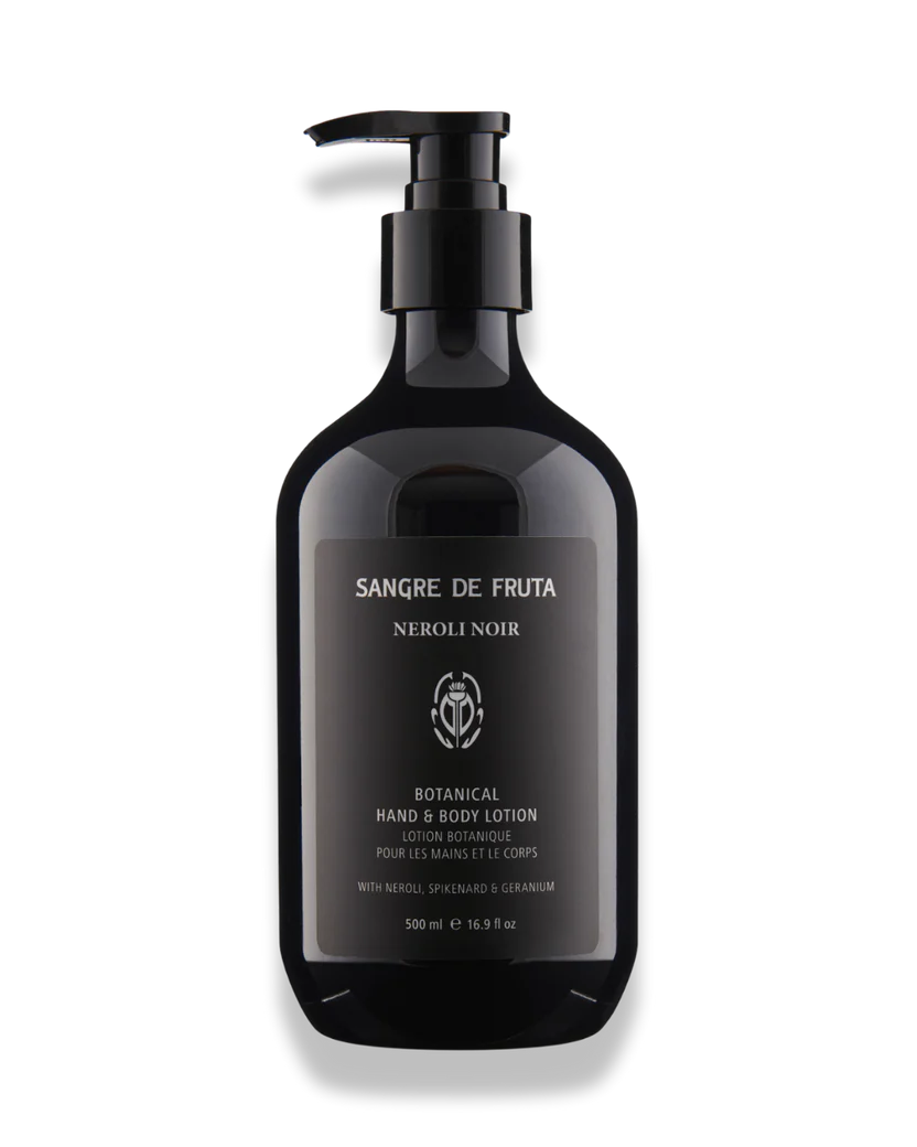 Black lotion bottle with pump labeled 'Sangre de Fruta' on a white background