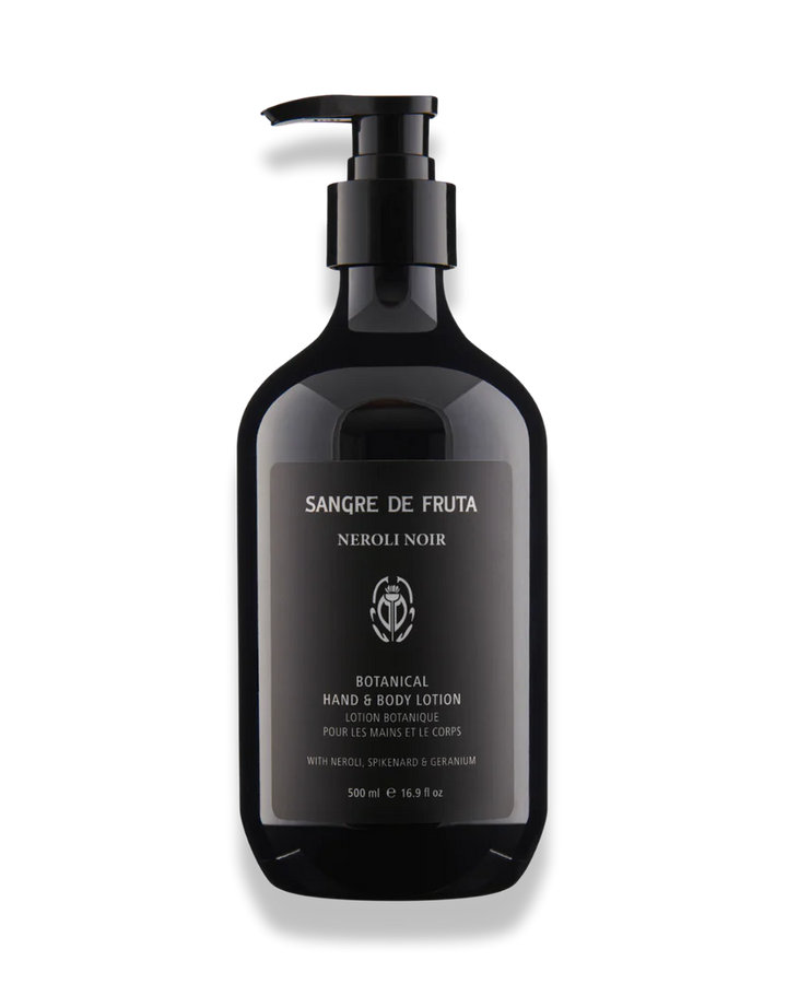 Black lotion bottle with pump labeled 'Sangre de Fruta' on a white background