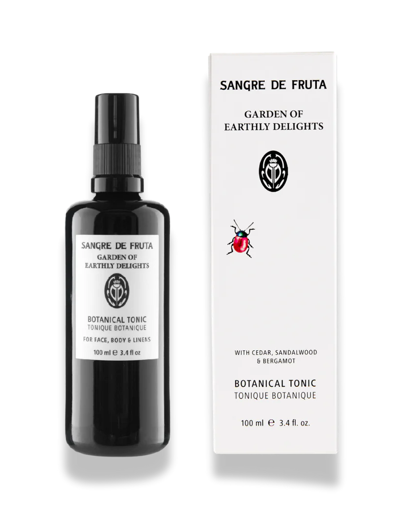 Sangre de Fruta botanical tonic bottle and packaging on a white background